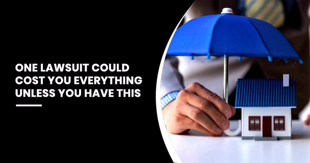 A person's hand holding a small blue umbrella over a miniature toy house to represent protection, paired with a black graphic panel containing the text "ONE LAWSUIT COULD COST YOU EVERYTHING UNLESS YOU HAVE THIS."