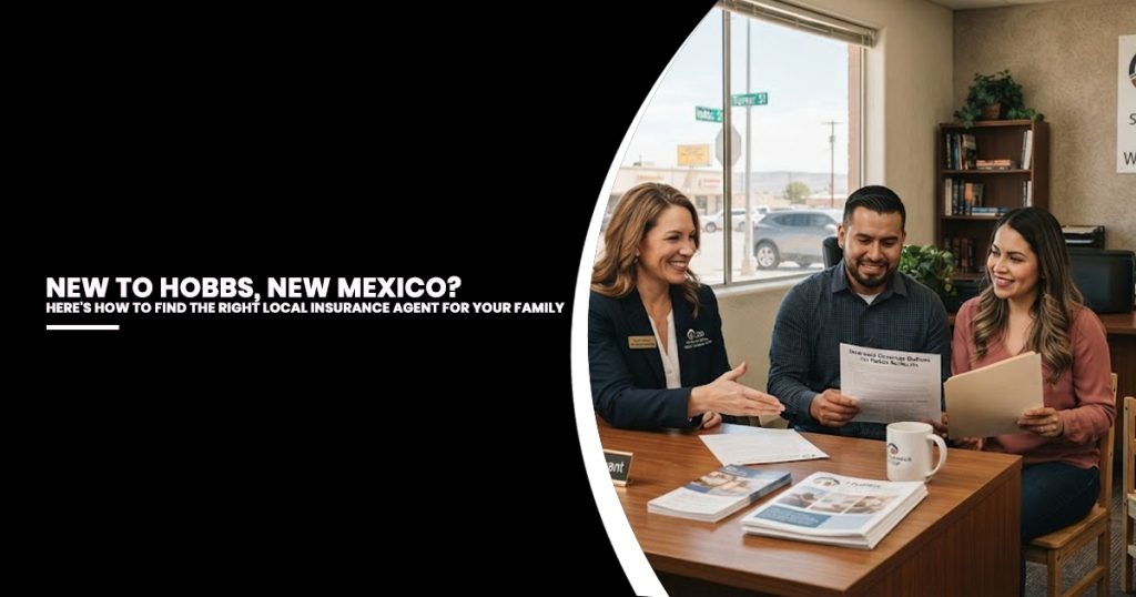 Female insurance agent in dark blazer discusses policy documents with a couple at a wooden desk in a bright office with street view windows.